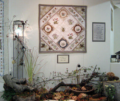 �����@��q